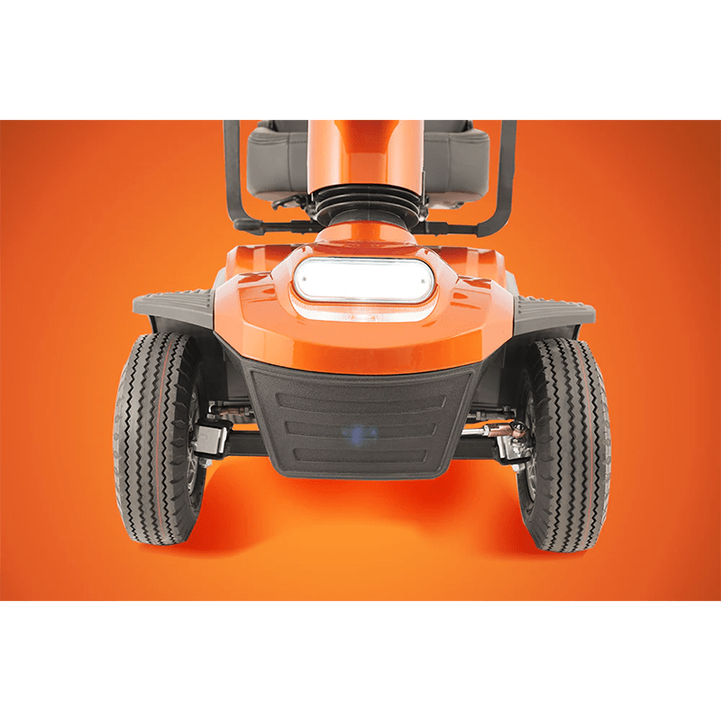Savvy 8 - Close-up of an orange lawn mower on an orange background