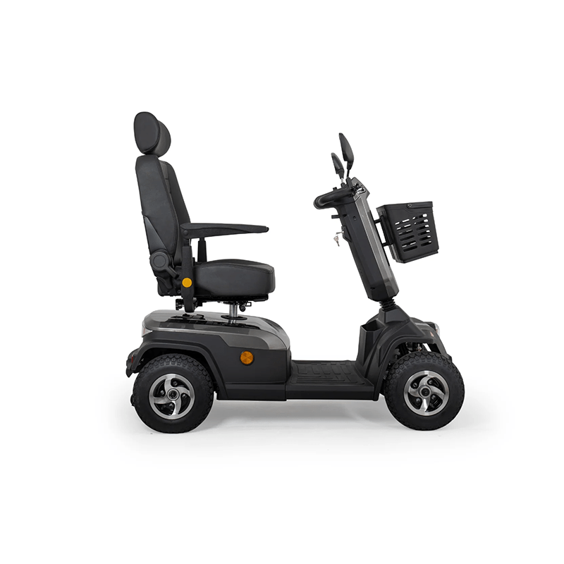 Scooterpac Savvy 8 Plus - Black mobility scooter with basket on a white background
