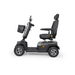 Scooterpac Savvy 8 Plus - Black mobility scooter with a basket on a white background